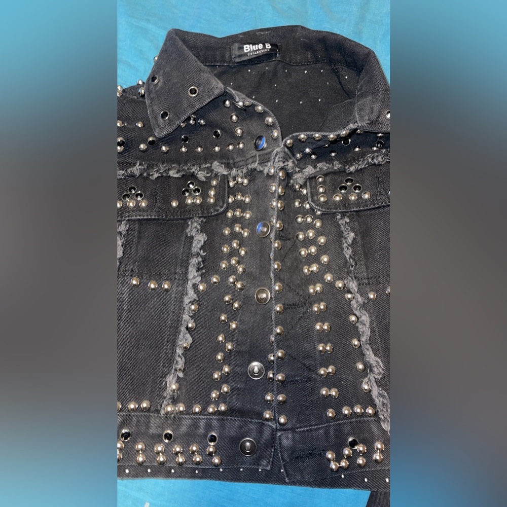 Woman’s black denim studded jacket